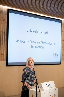 Dr Nicola Hancock in front of screen  2025-41.png